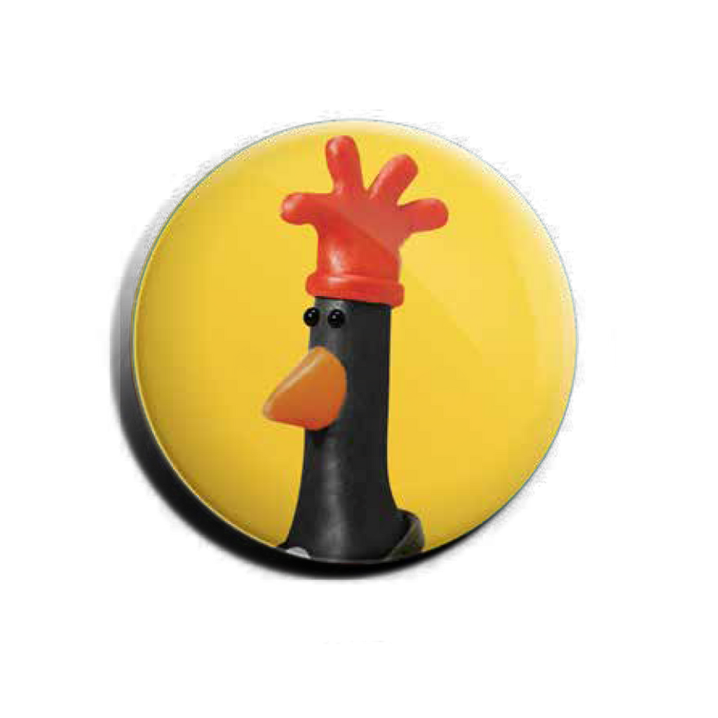 Yellow badge featuring Aardman's Feathers McGraw from 'The Wrong Trousers'.