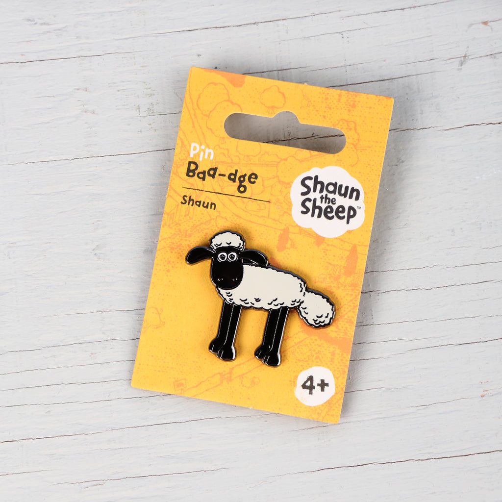 Enamel pin badge of Shaun the Sheep on all fours. 