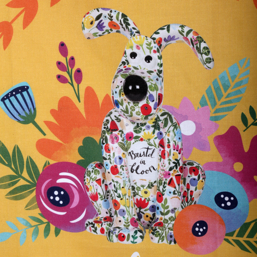 Blossom Gromit Unleashed tea towel. Reads 'Bloom where you are planted'.  
