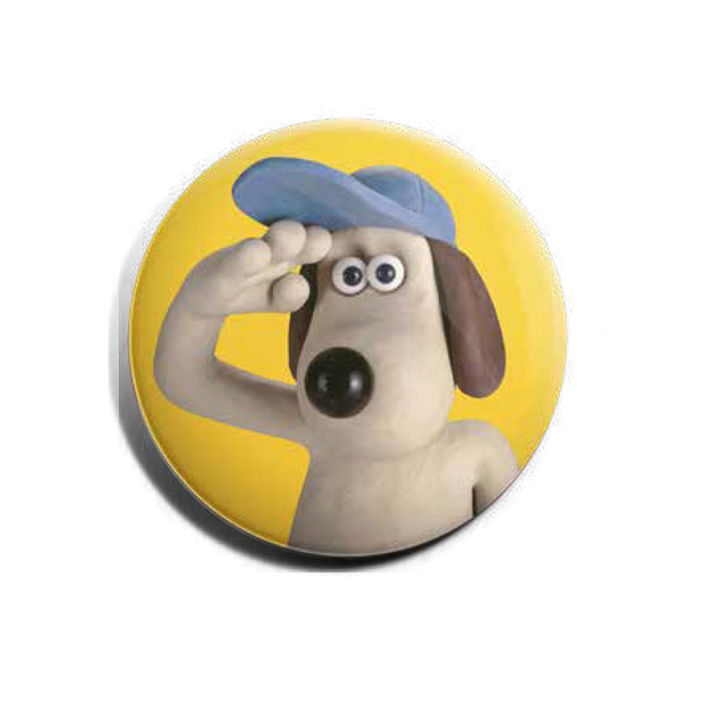 Yellow badge featuring Aardman's Gromit, saluting in a blue cap. 