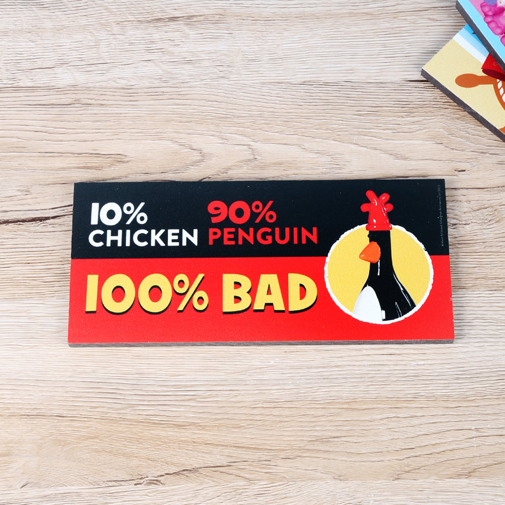 Gromit Unleashed sculptures on room signs / door plaques. Features Feathers McGraw and text: '10% Chicken 90% penguin 100% bad'. 