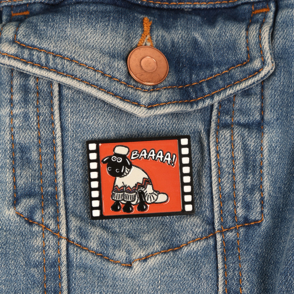 Shaun the Sheep with 'BAAAA!' on an orange background