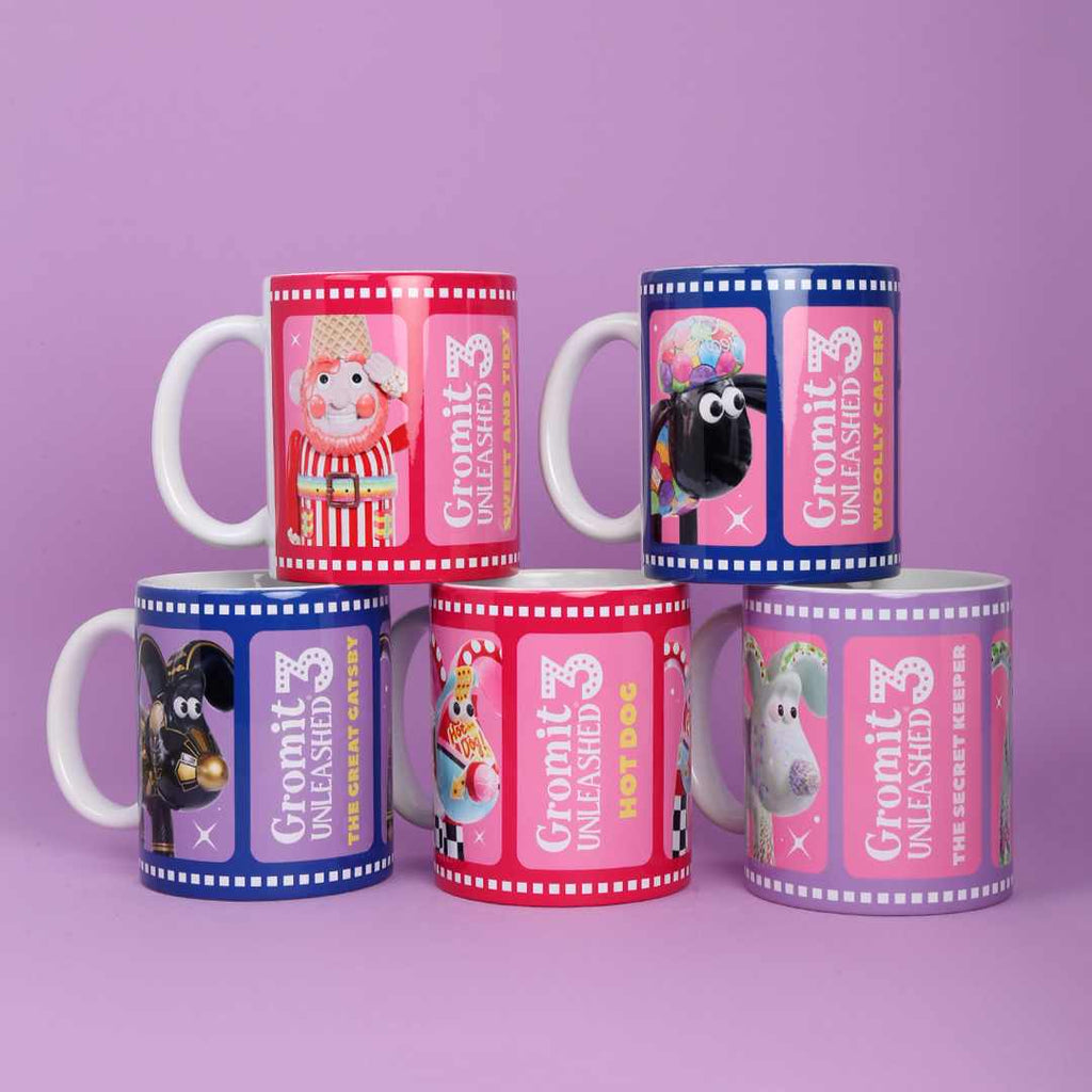 Set of five colourful mugs with Gromit Unleashed 3 sculpture designs on a purple background 