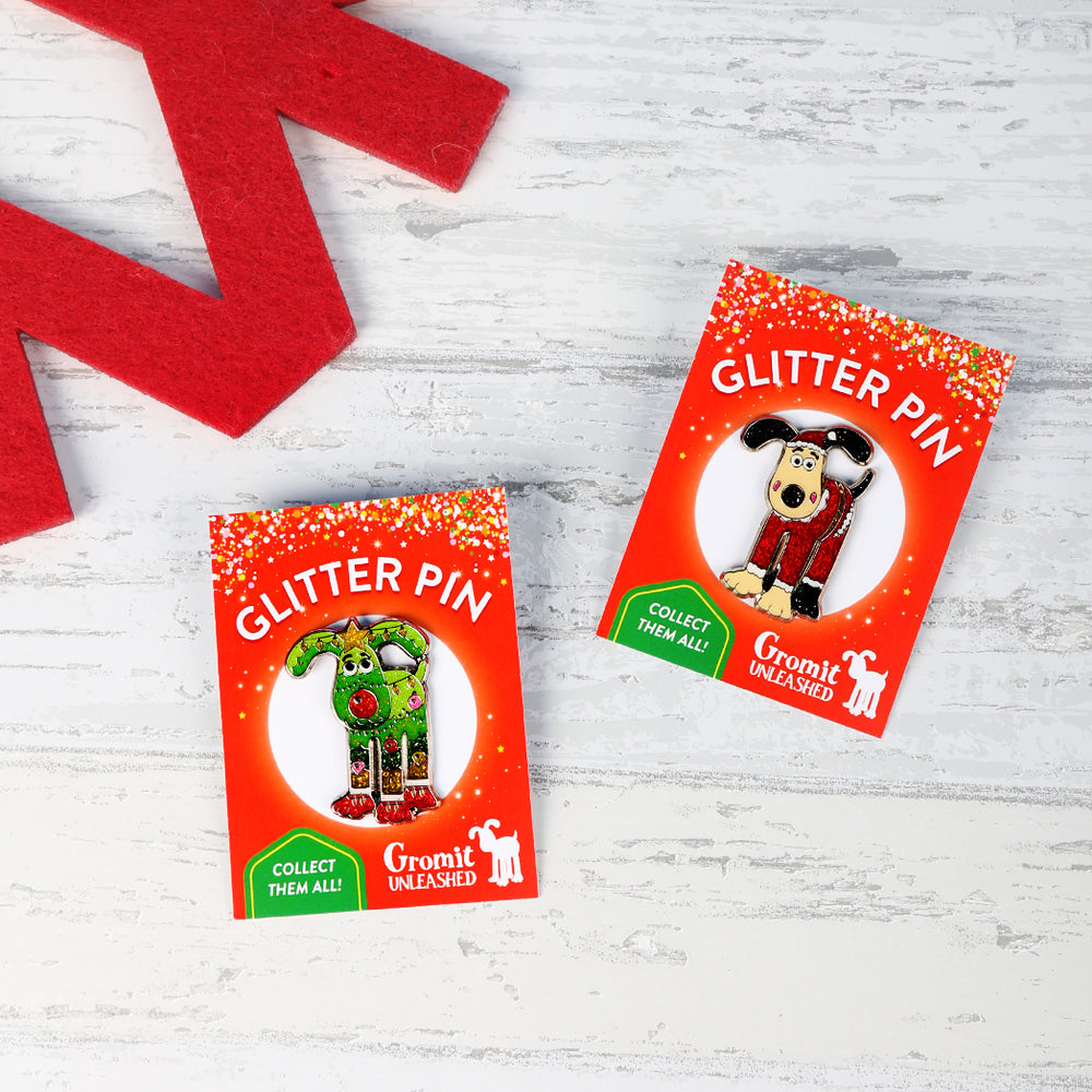 Noël and Santa Paws glitter pin badges