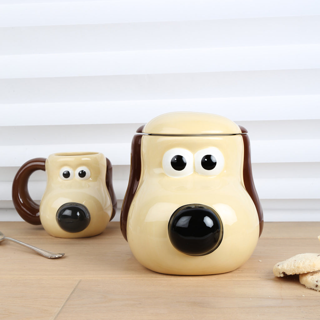 Gromit Head Cookie Jar with biscuits and Gromit head mug