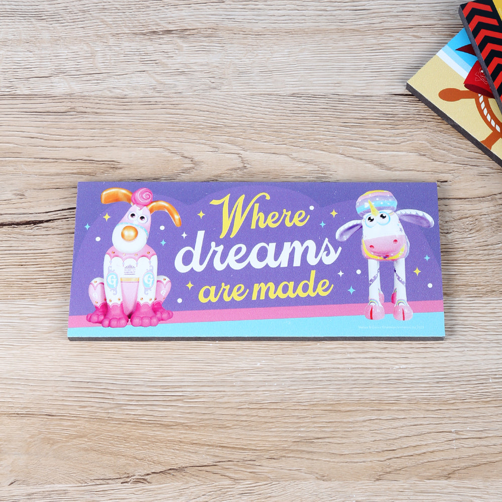 Gromit Unleashed sculptures on room signs / door plaques. Features Sparkles the Unicorn and Merry-go Gromit and reads 'Where dreams are made'. 