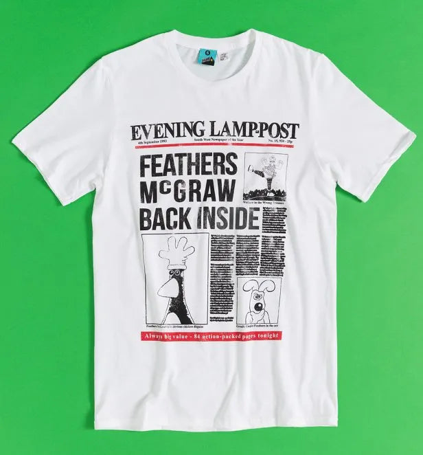 White t-shirt featuring a graphic of a newspaper headline. Headline reads: Feathers McGraw back inside' with pictures of Feathers McGraw, Gromit and The Wrong Trousers. 