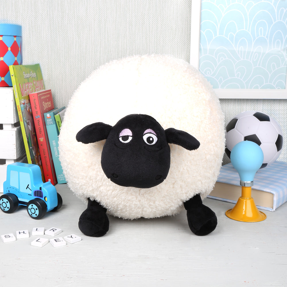 Large Shirley the sheep soft toy, round and super soft, between books and toys