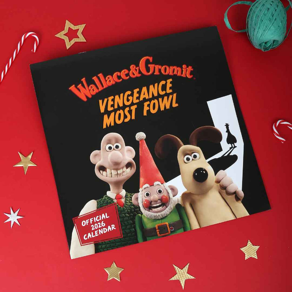 Wallace & Gromit calendar on a red background with festive decorations
