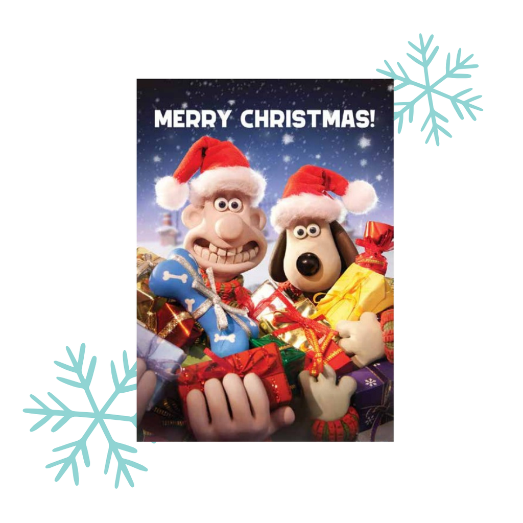 Wallace and Gromit in Christmas hats with presents and 'Merry Christmas!' text on a snowy background.