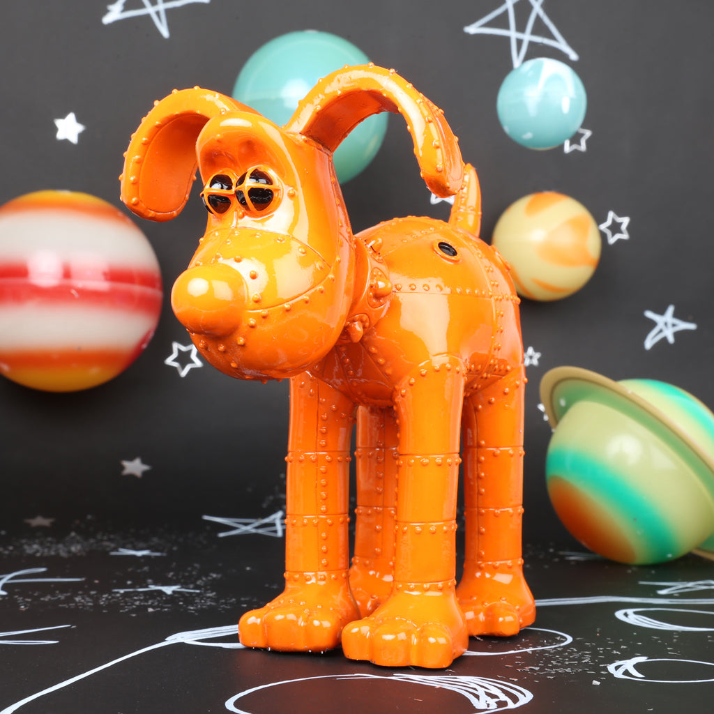Gromit figurine from the Gromit Unleashed Trail inspired by the orange rocket from Wallace & Gromit's  'A Grand Day Out'. Orange with bolt join effect. 