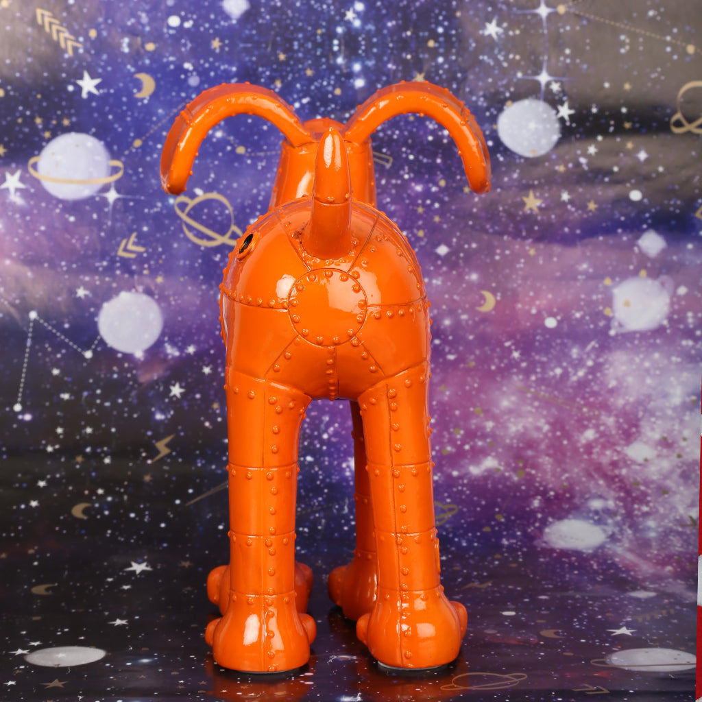 Gromit figurine from the Gromit Unleashed Trail inspired by the orange rocket from Wallace & Gromit's  'A Grand Day Out'. Orange with bolt join effect. 