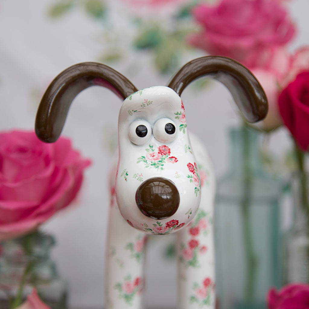 Antique Rose Gromit Unleashed Figurine by Cath Kidston. Close-up front view. Floral figurine featuring popular rose print 