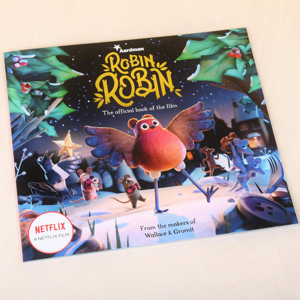 Cover image of paperback Robin Robin book, featuring Robin, the mouse family and Magpie crossing the snow at night