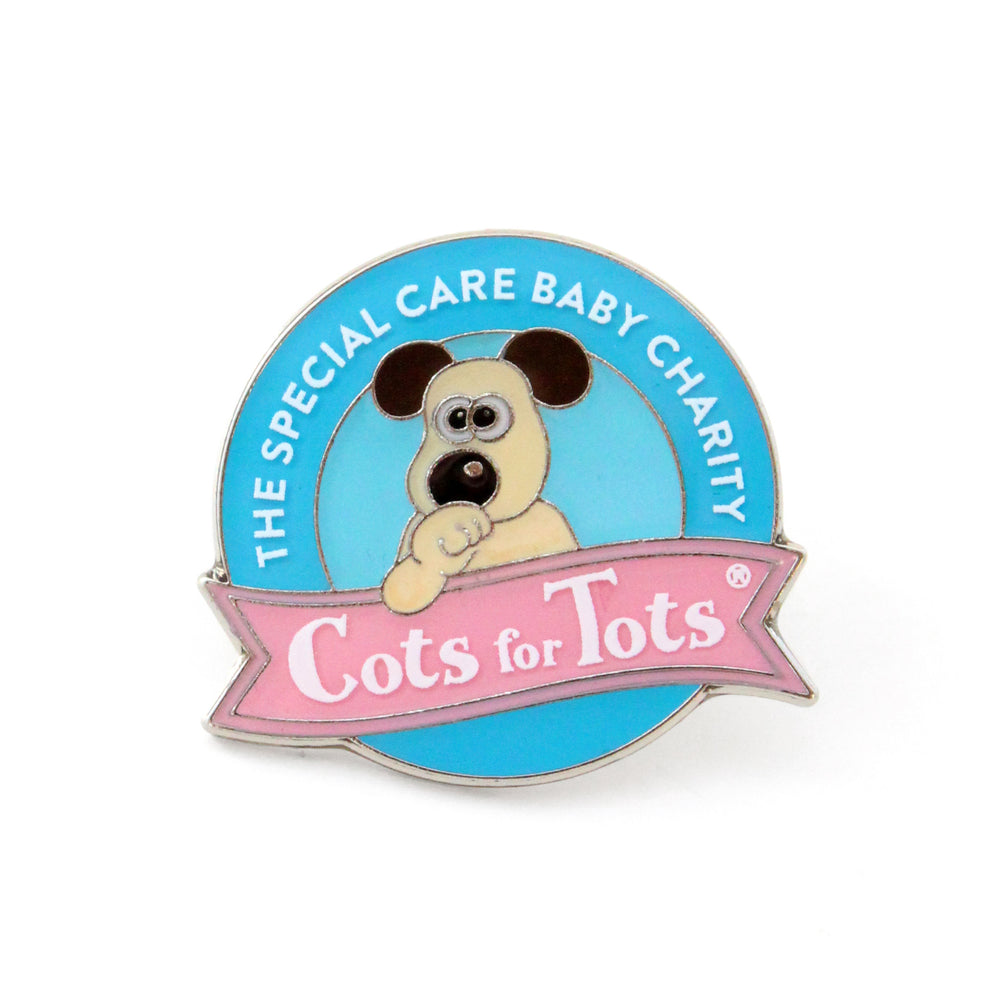 Cots for Tots pin badge