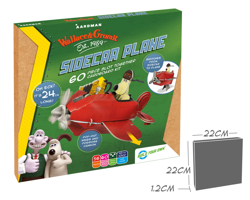 The packaging for the Build your own Wallace & Gromit Sidecar Plane Kit. Gromit sat in red plane. 