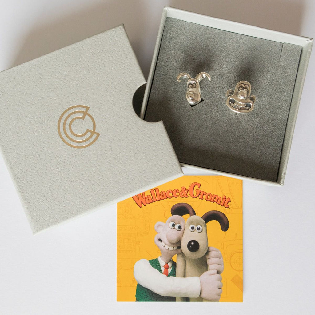 Wallace and gromit cufflinks, each silver cufflink features one of the characters' heads